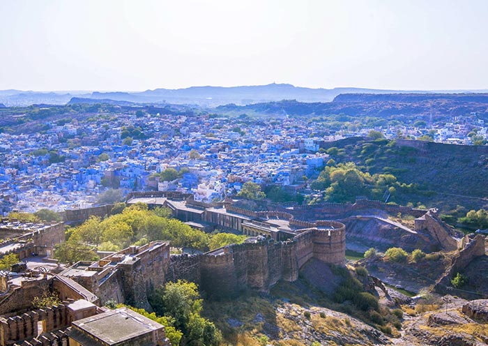 Vivid blue-painted houses that dot its landscape in Jodhpur