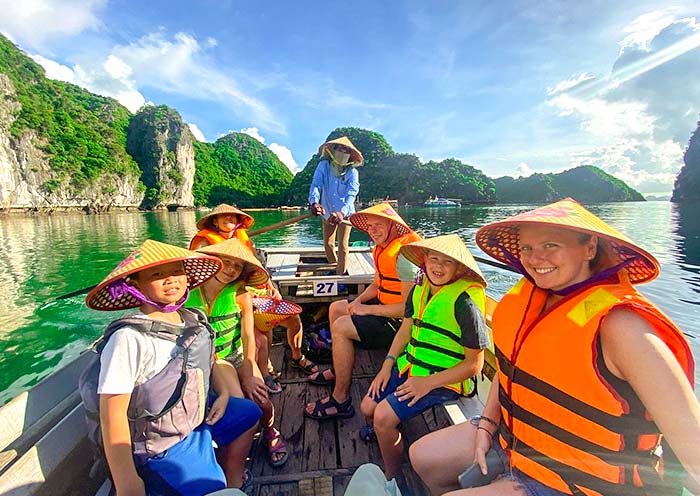 Paddle through emerald waters in Halong Bay