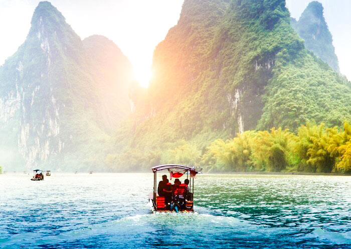 Relaxing bamboo raft to Xingping Town